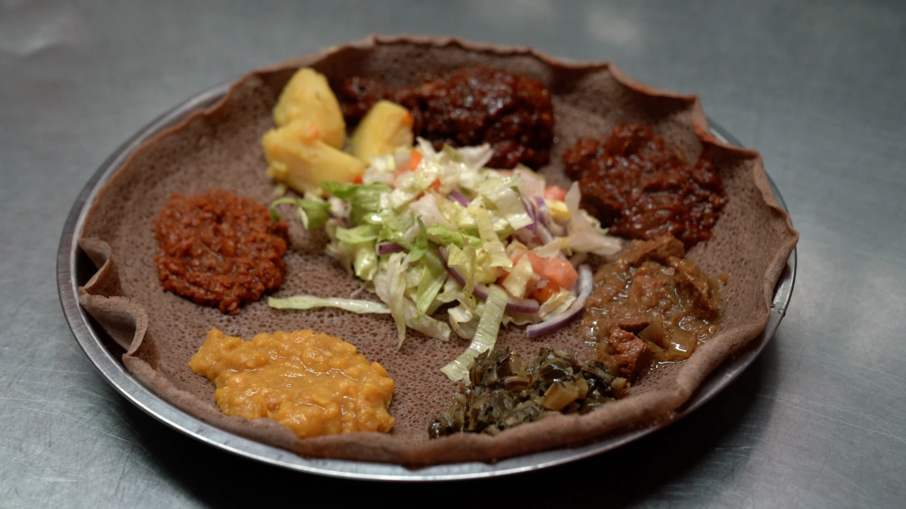 Louisville restaurant offers informal course on Ethiopian dining and hospitality